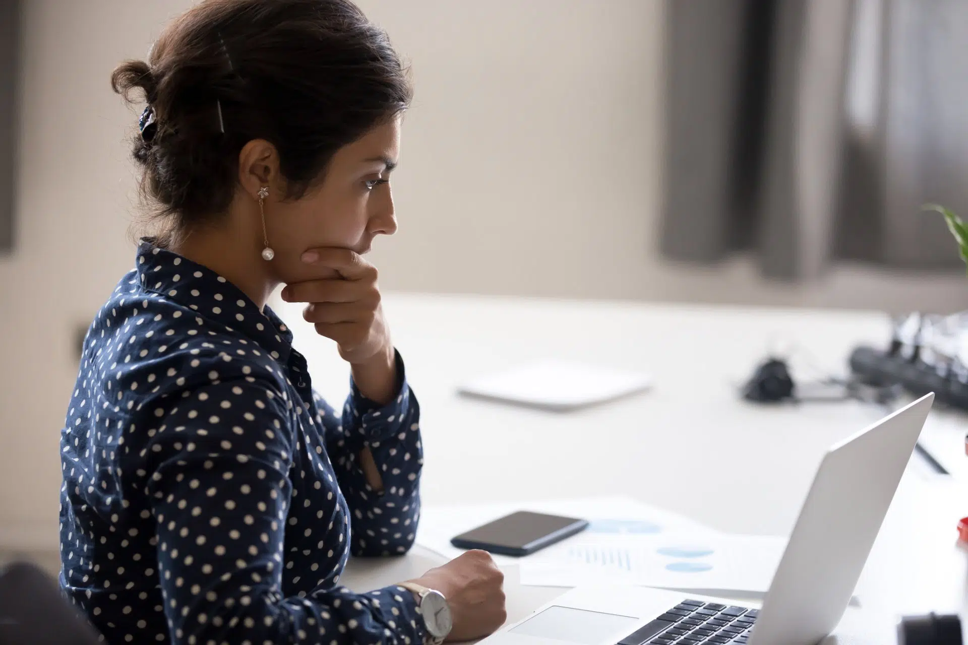 An image of a woman looking uncertain