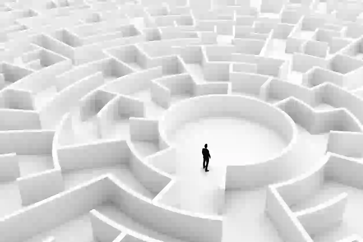 Businessman in the middle of the maze. Concepts of finding a solution, problem solving, challenge etc. 3D illustration