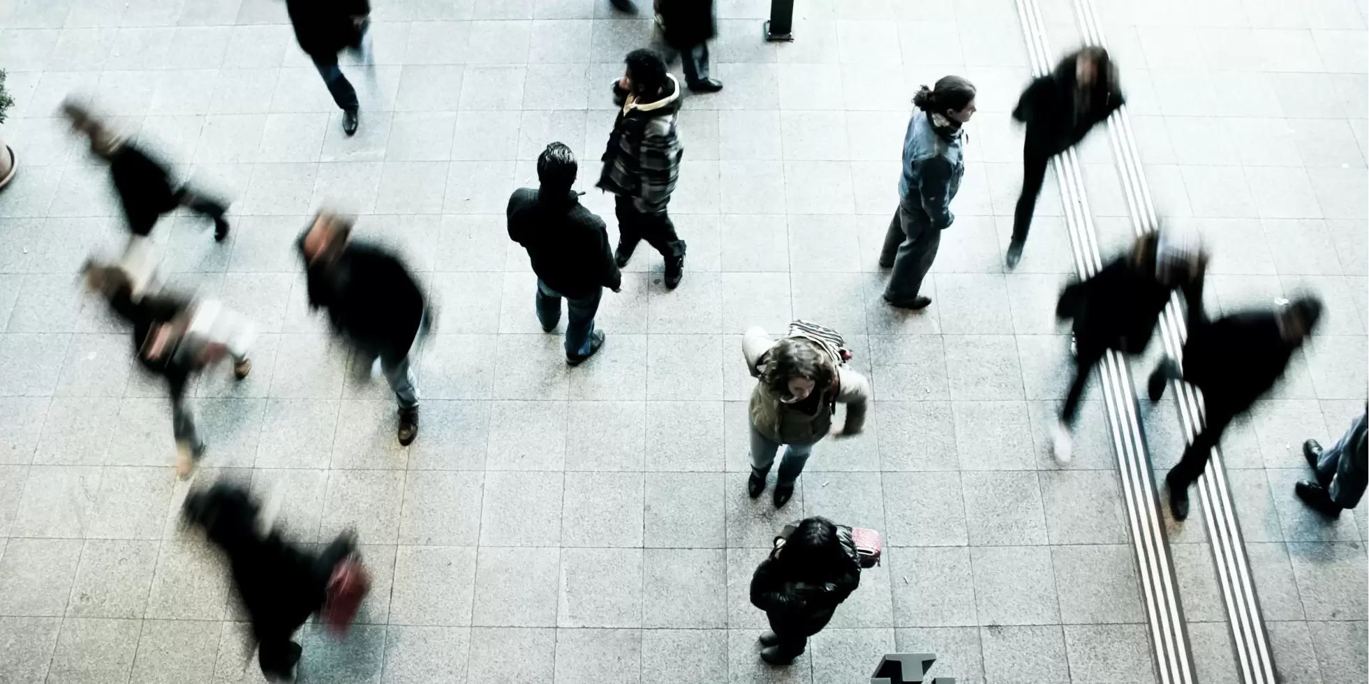 An aerial image of pedestrians walking